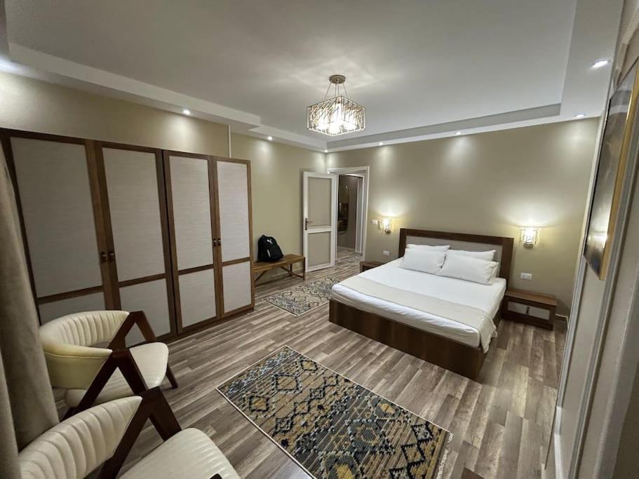 Skyline Luxury Suites 5 Mins From Cairo Airport Exterior photo
