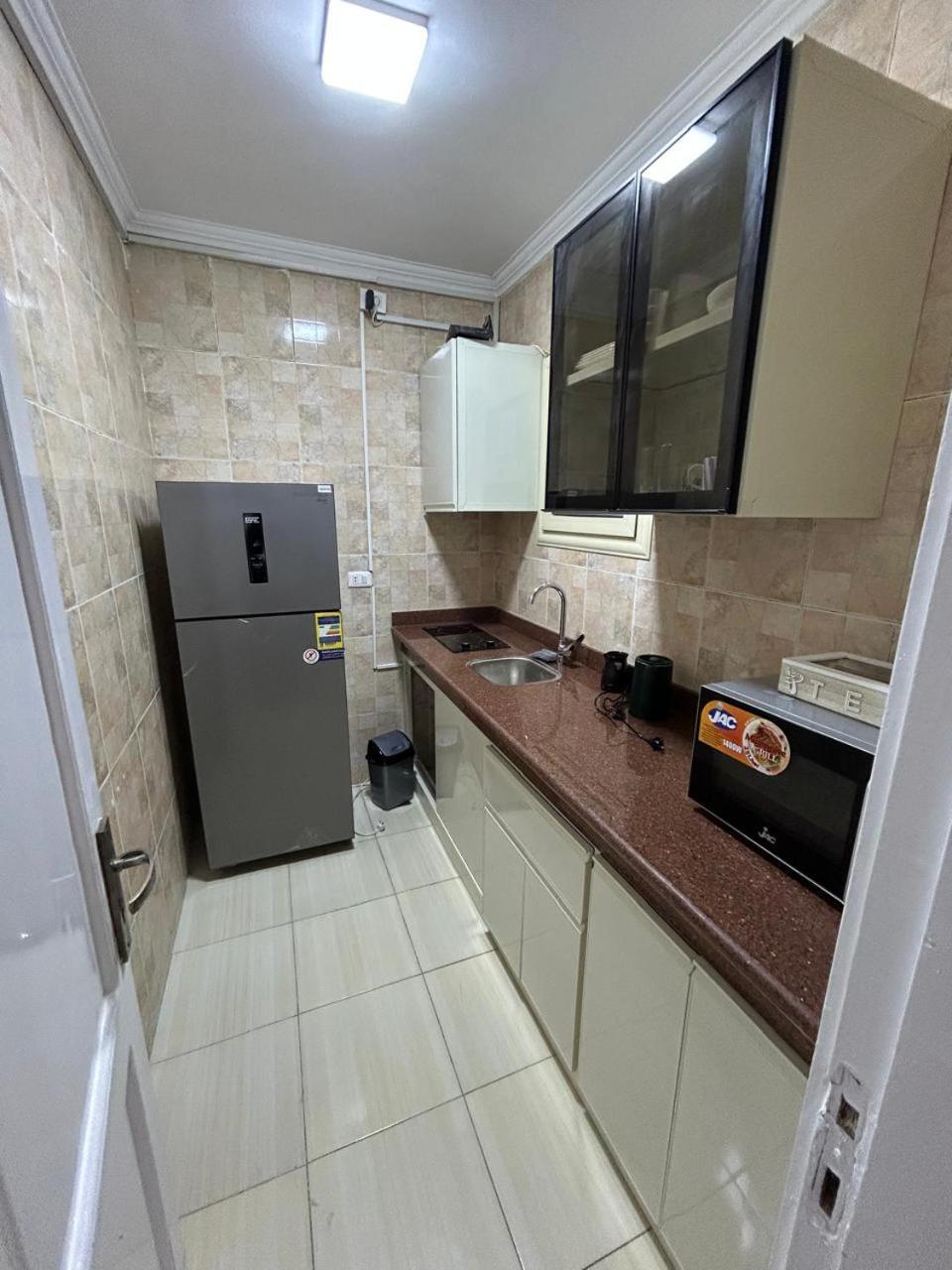 Skyline Luxury Suites 5 Mins From Cairo Airport Exterior photo