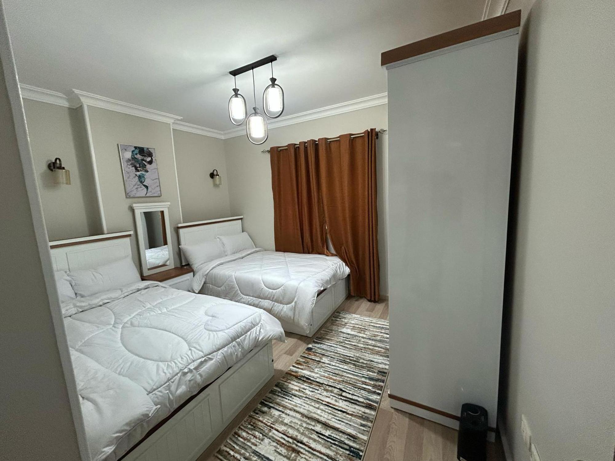 Skyline Luxury Suites 5 Mins From Cairo Airport Exterior photo