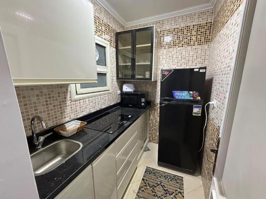 Skyline Luxury Suites 5 Mins From Cairo Airport Exterior photo